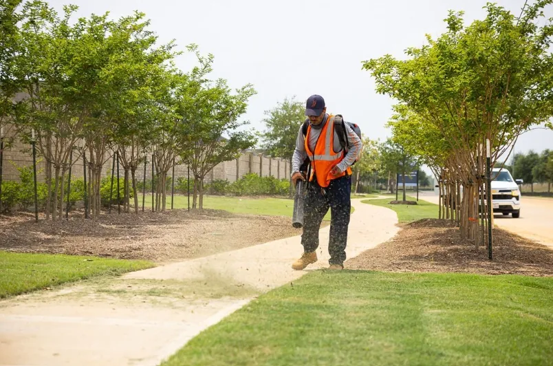 Manicured commercial grounds with flower beds and walkways in Greater Vancouver